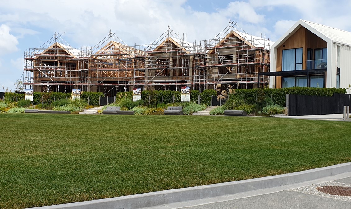 Four Oval houses under construction_side view-1.jpg
