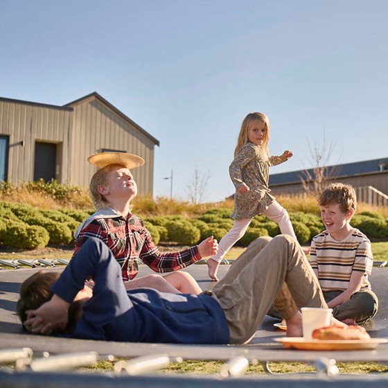 Kids on tramp_gradedforhomepage.jpg